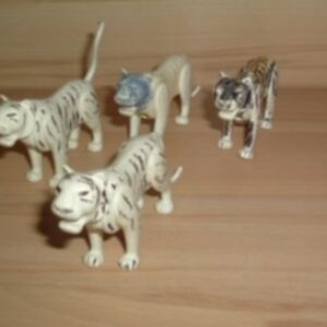 Lot 4 tigres blancs cassés et en mauvais état Playmobil